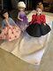 Bundle of previously-owned Madame Alexander Cissette dolls, with doll stands