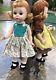Lot of 2 1956 and 1957 Madame Alexander-kins tagged dress with pinafore