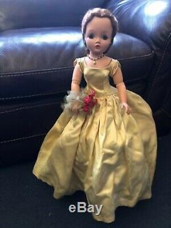 Madame Alexander Cissy doll with Yellow Slipper satin Gown with flowers