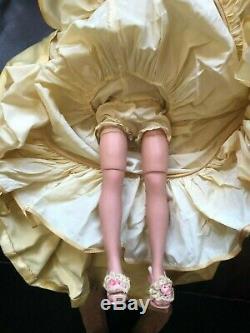 Madame Alexander Cissy doll with Yellow Slipper satin Gown with flowers