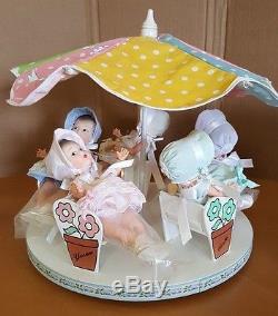 Madame Alexander Dionne Quintuplets 75th Anniversary Carousel and Dolls