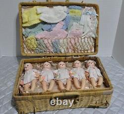 Madame Alexander Fisher Quintuplets Dolls come in a basket case with clothes