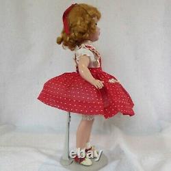 Vintage Madame Alexander 14 Maggie teenager doll, tagged red dotted Swiss dress